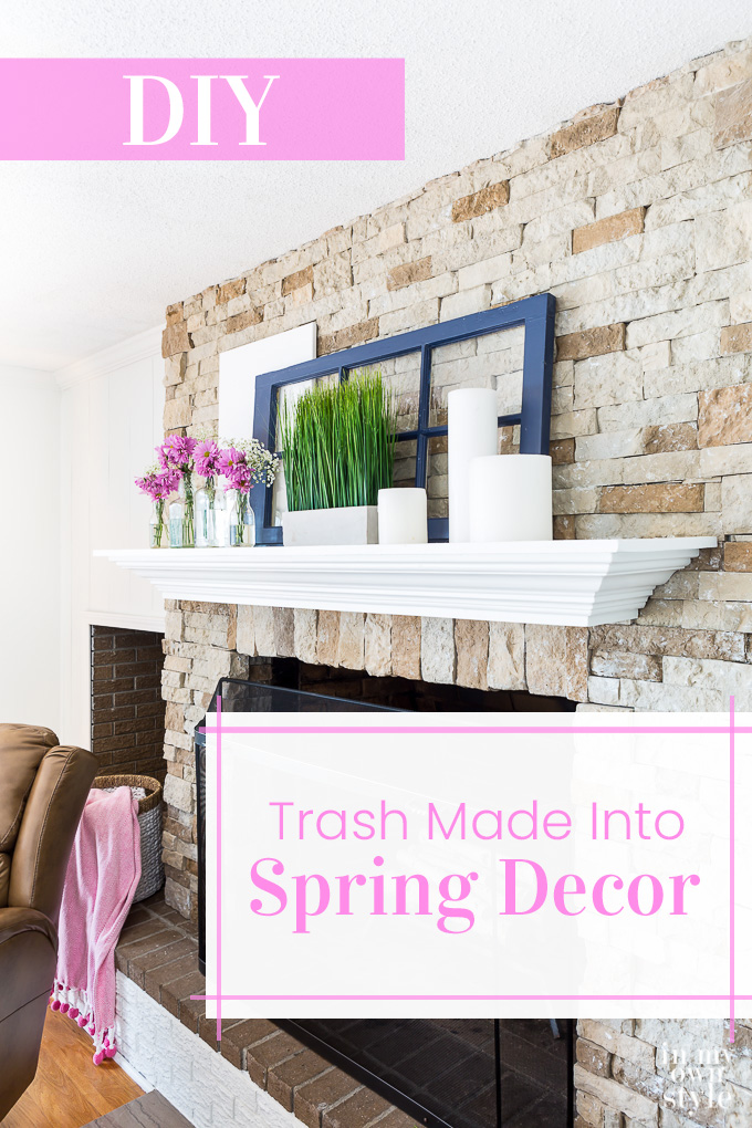 Stone fireplace and white mantel with pink and blue spring decor