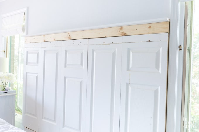 how to tutorial on how to make a headboard using old doors