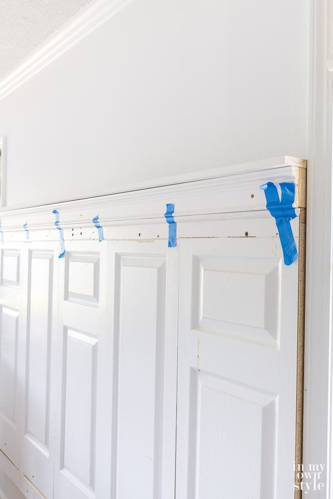 step by step photo tutorial showing how to make a headboard using old doors