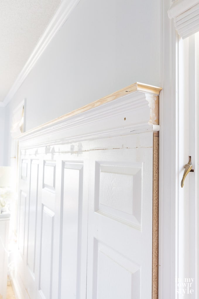 photo tutorial showing how to make a headboard using old doors