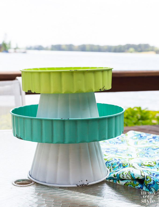 Two pedestal serving trays from The Trisha Yearwood Home Collection sold exclusively at Tractor Supply.