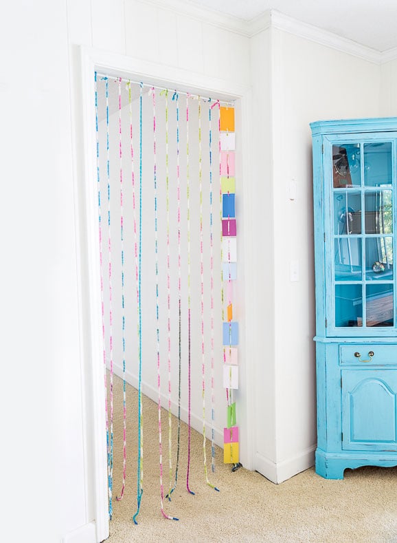 Creative DIY paint chip crafts and decor for a room in your home.