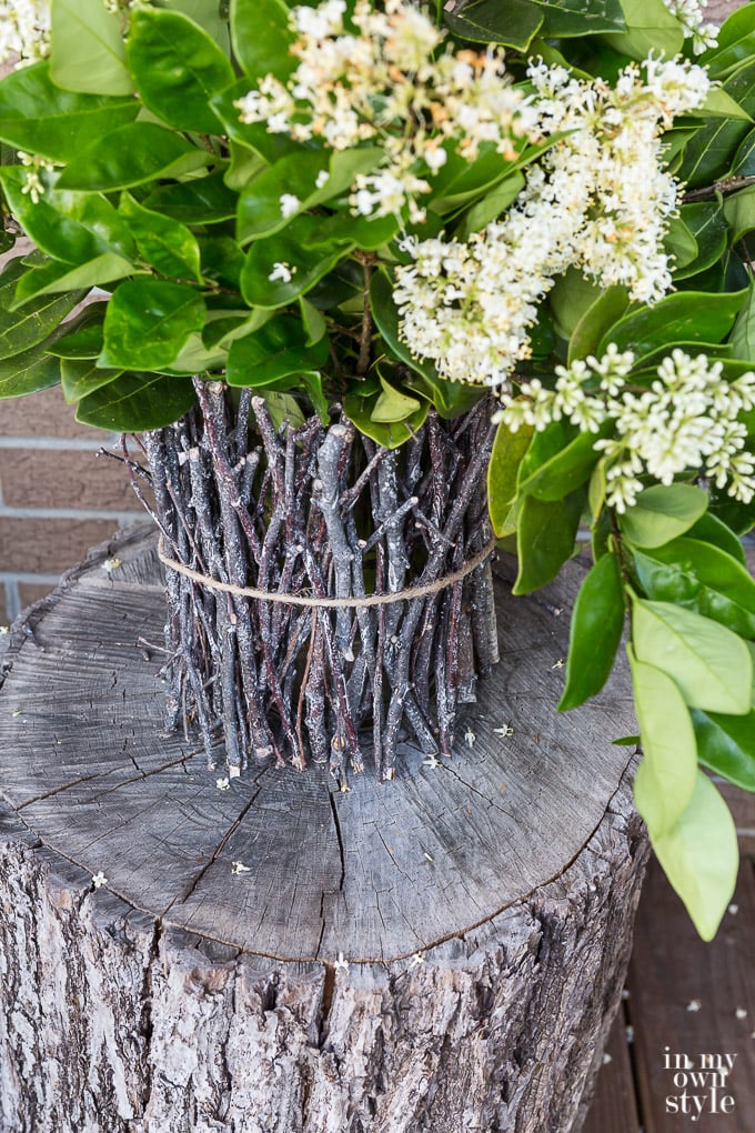 how to make an easy DIY rustic twig vase to showcase your favorite flowers