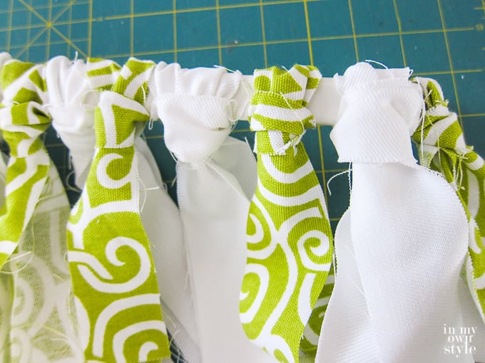 Fabric strips tied on curtain rod