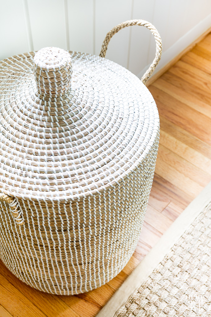 Lidded basket on floor
