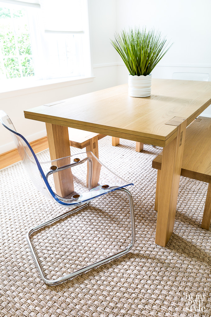 Dining room table from West Elm on seagrass rug
