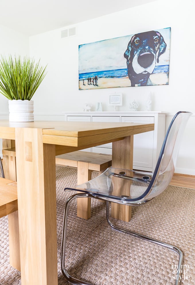 Modern White and light wood toned decorated dining room