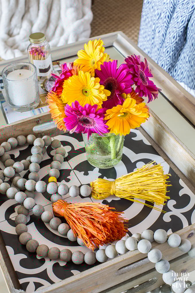 Tray with yellow and fuschia flowers