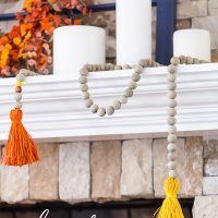 How to decorate a mantel for fall using colorful items you may already own.