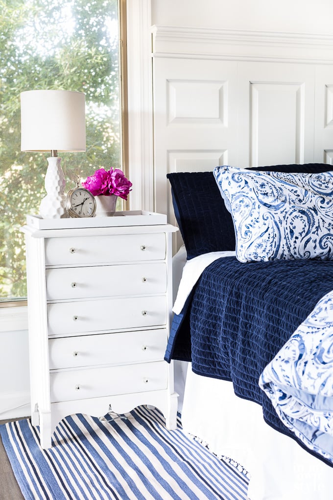 Blue and white decorated master bedroom.
