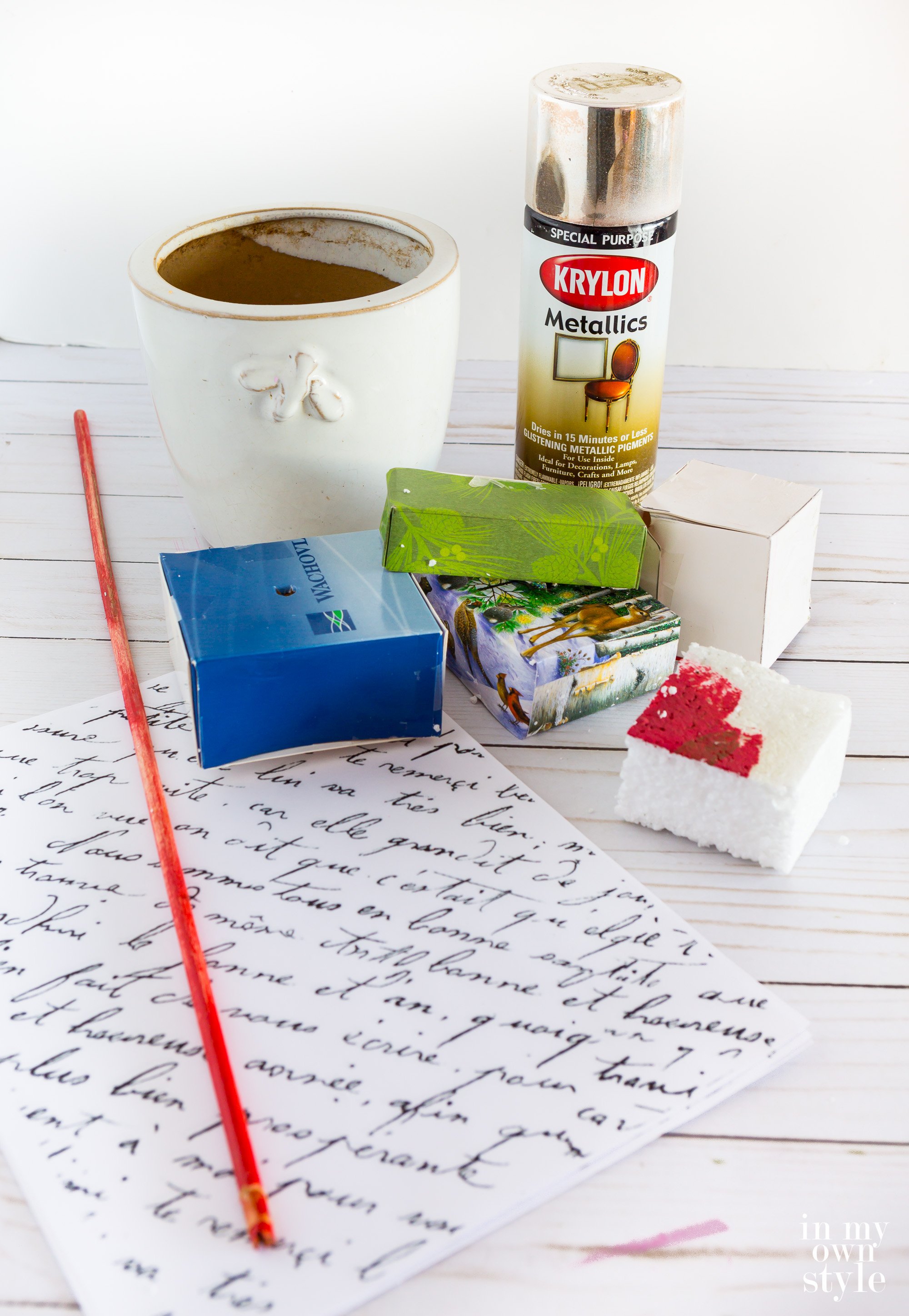 supplies needed to make a stacked box Christmas tree for a table or mantel