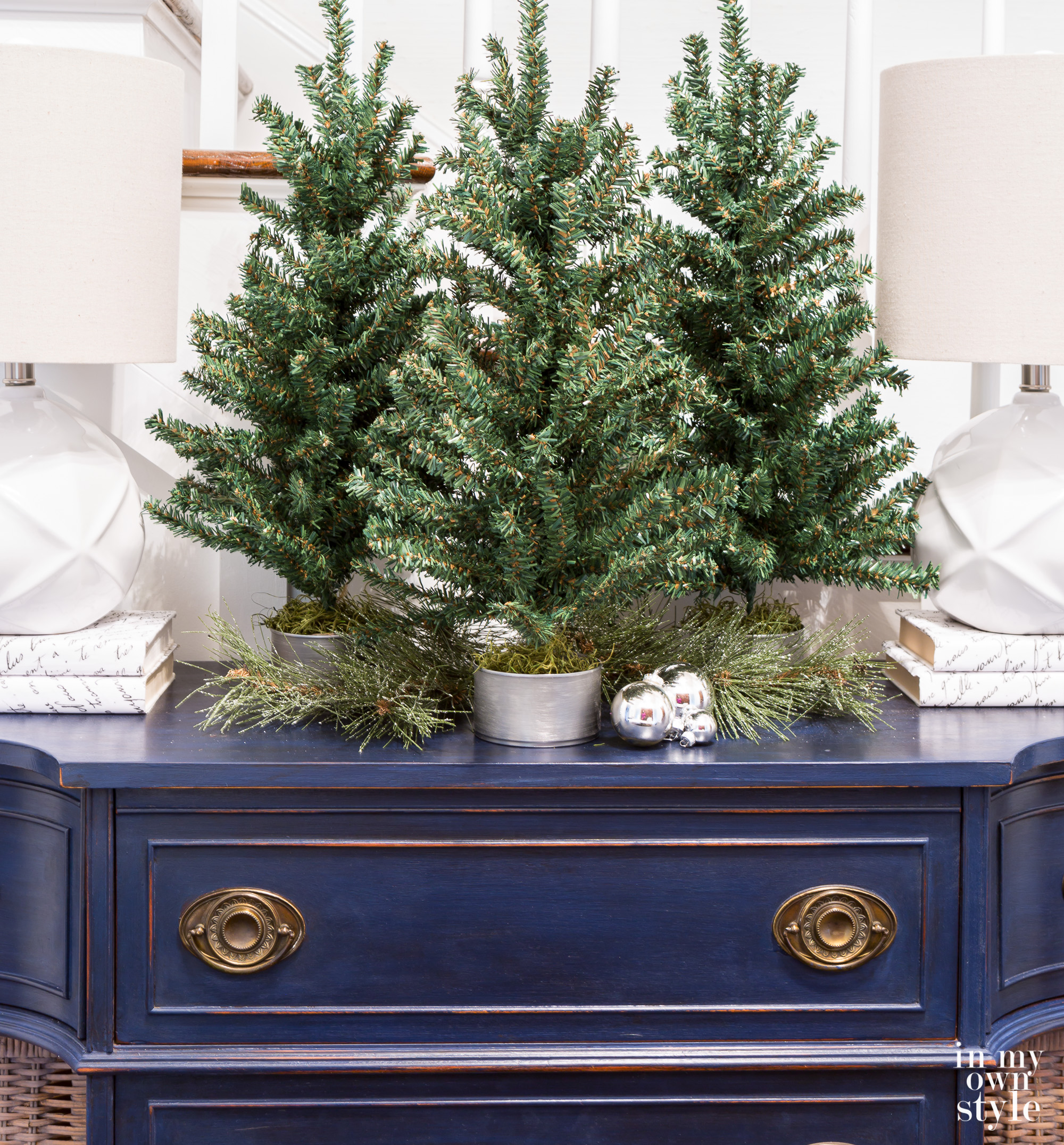 Tabletop Christmas tree decorating idea using tuna cans