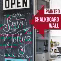Painted black chalkboard wall in kitchen.