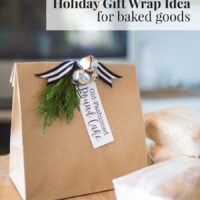 holiday baked goods placed in a brown paper bag with jingle bells to give as a hostess gift.