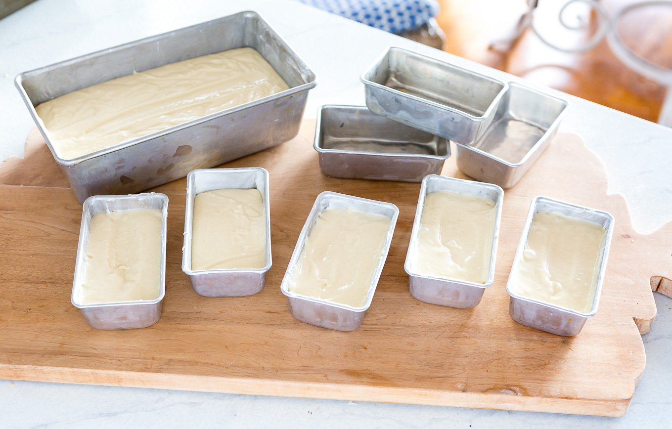 Mini loaf pans filled with Old Fashioned Lemon Pound Cake batter