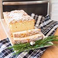 Just baked Old Fashioned lemon pound cake on white plate