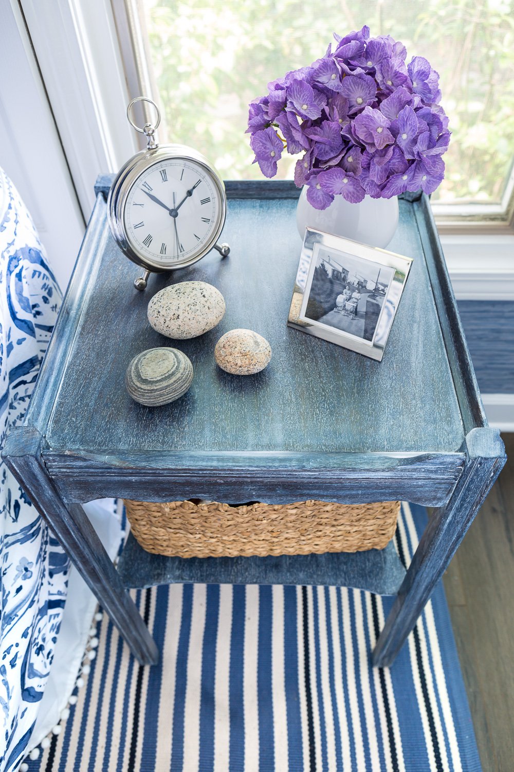 Creating a color wash of paint on furniture and then adding white wax to make the finish look like denim. It is the perfect dark blue finish for waterside or coastal decorated rooms.