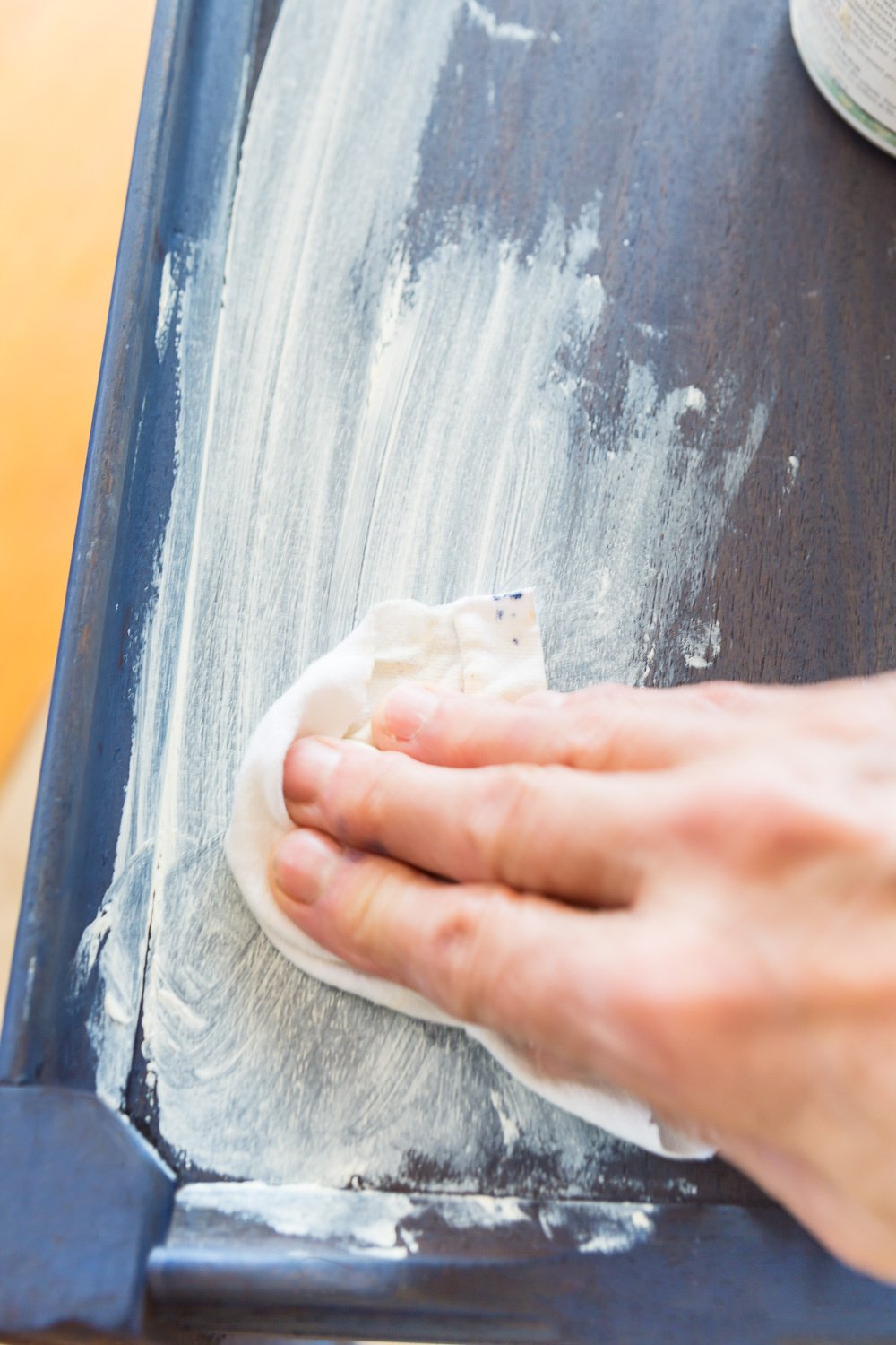 How to apply white wax over a piece of paint color washed furniture