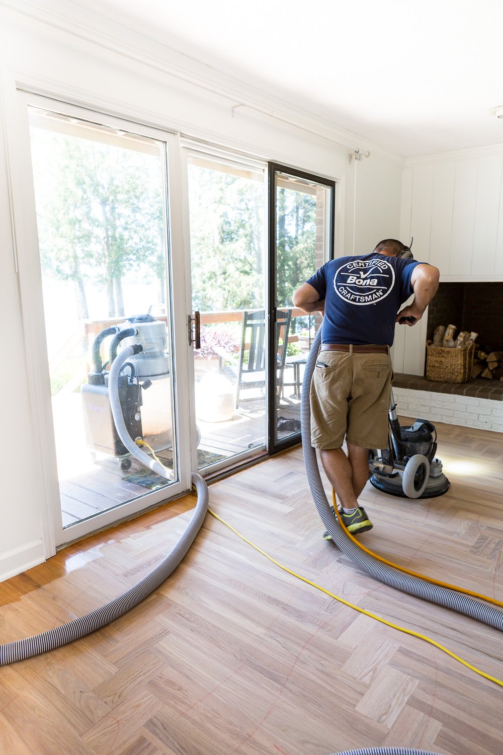 Bona hardwood floor professional sanding a hardwood floor to prep it for stain and top finish