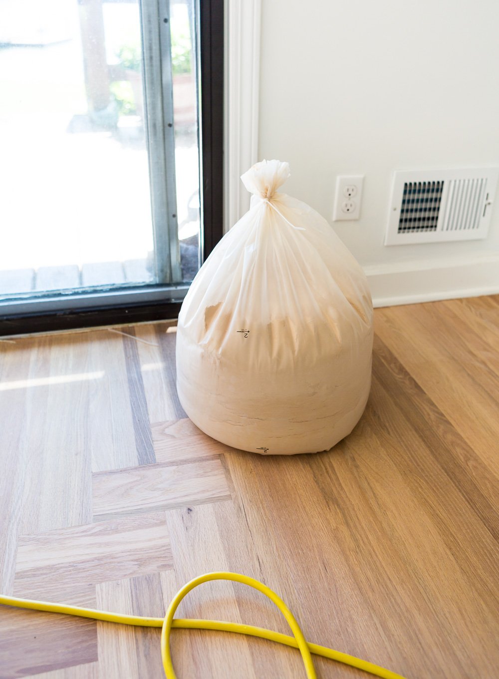 Bagged sanding dust that doesn't get everywhere