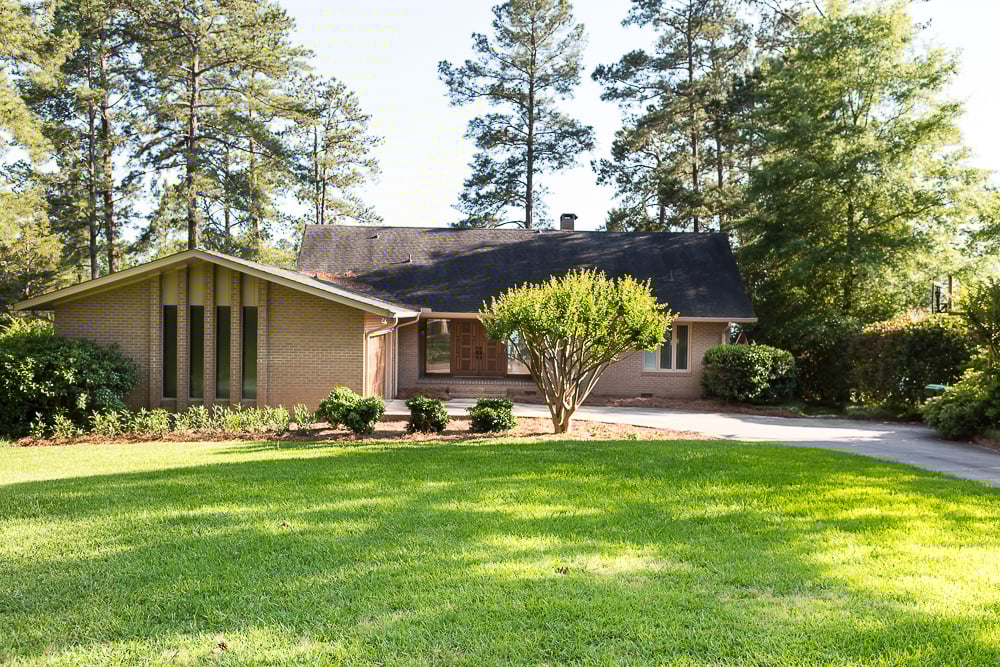 Front of house in dabbled shade