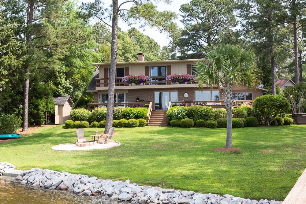 Lake side of 1970 era home that got a new coat of paint