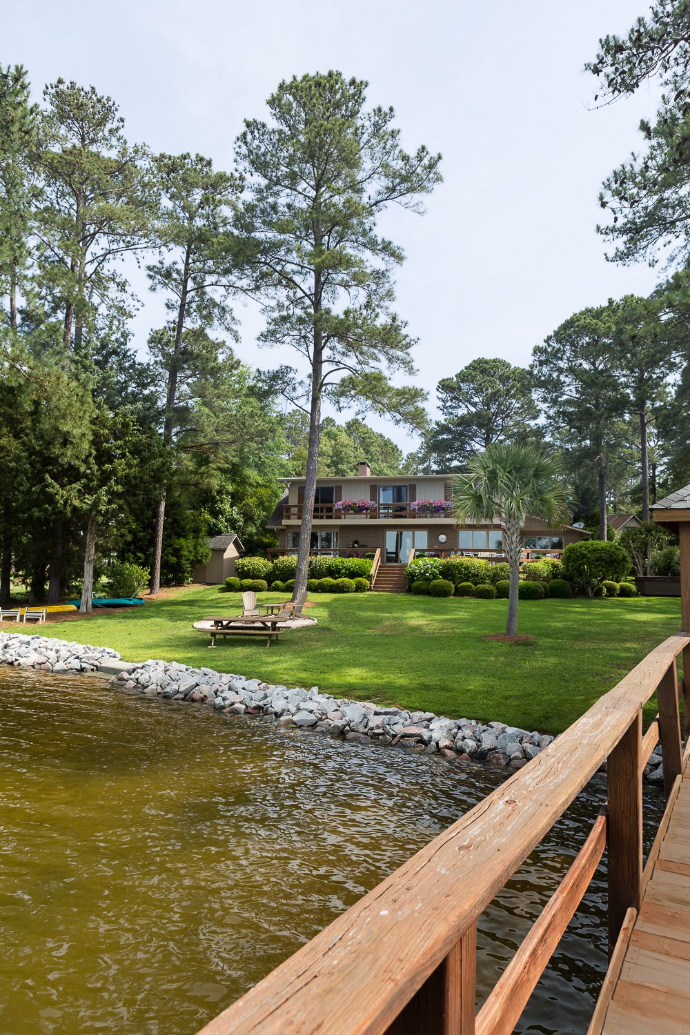 Lake house painted in Glidden premium paint in the color Khaki Bronze