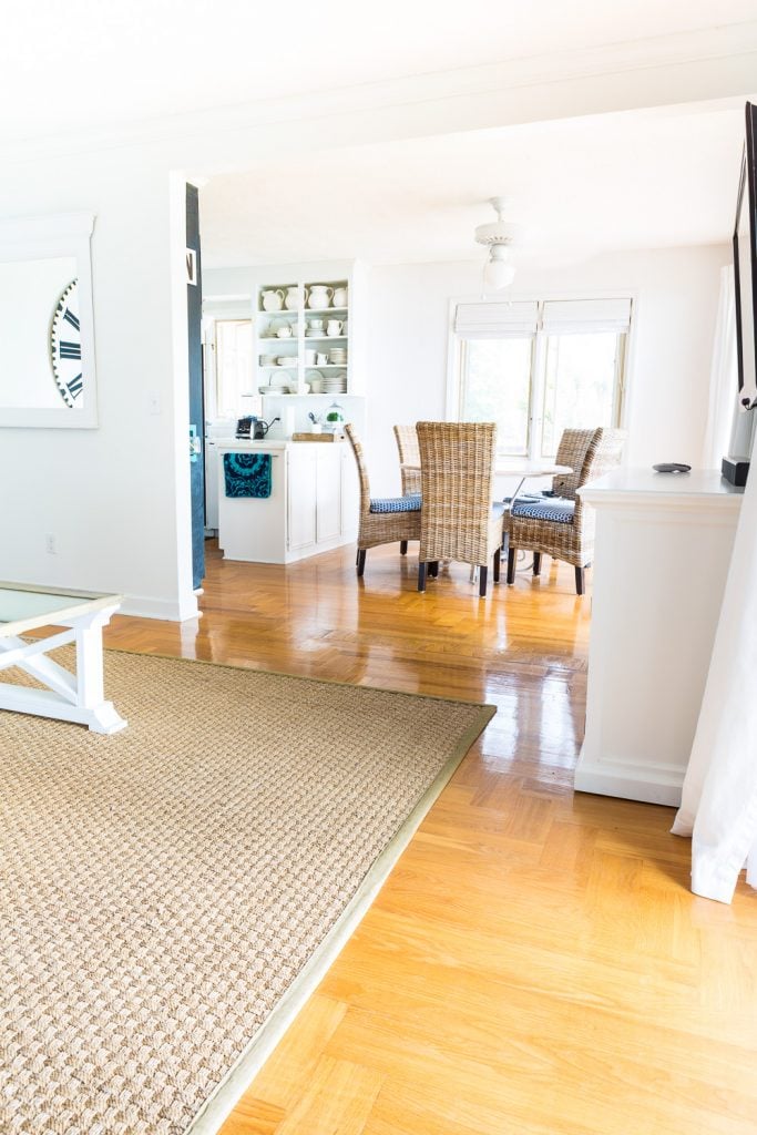 Living room showing hardwood floor that has turned orange over time