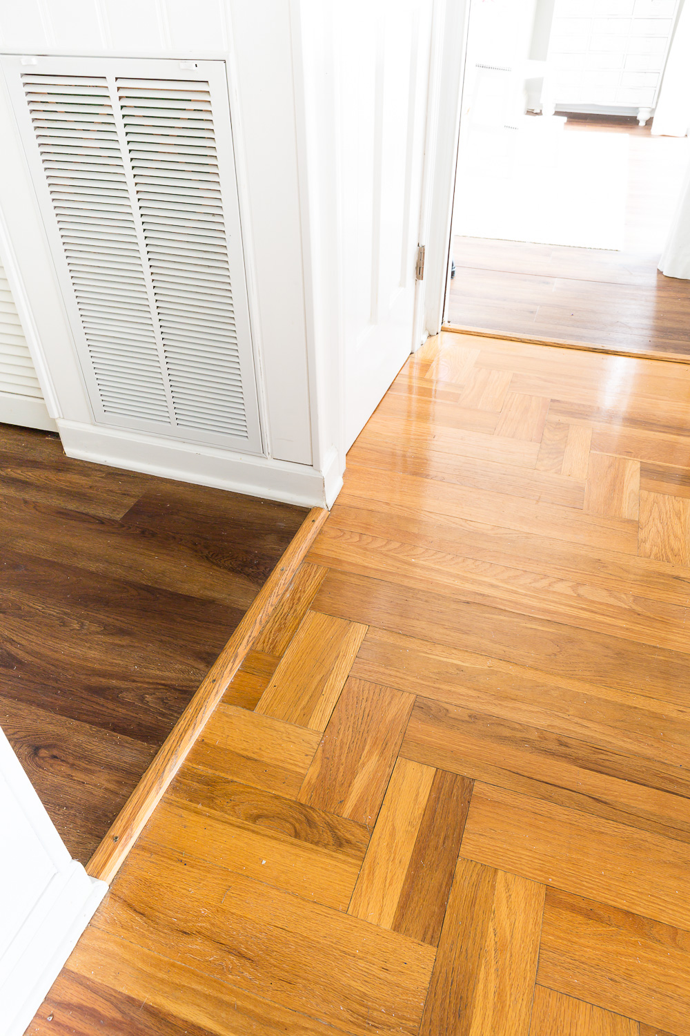 Different shades of wood flooring in a home.