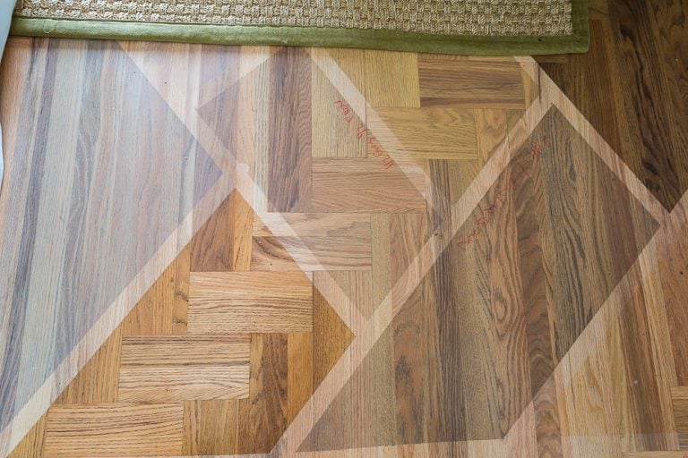 Most popular wood stain colors being tested on a just sanded hardwood floor to be refinished