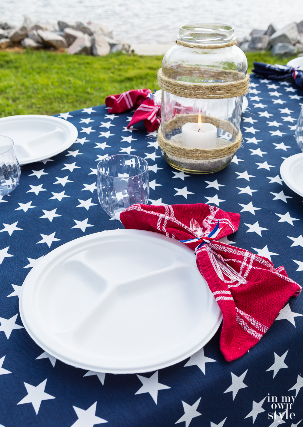 Patriotic blue tablecloth with white stars and Chinet Classic White plates