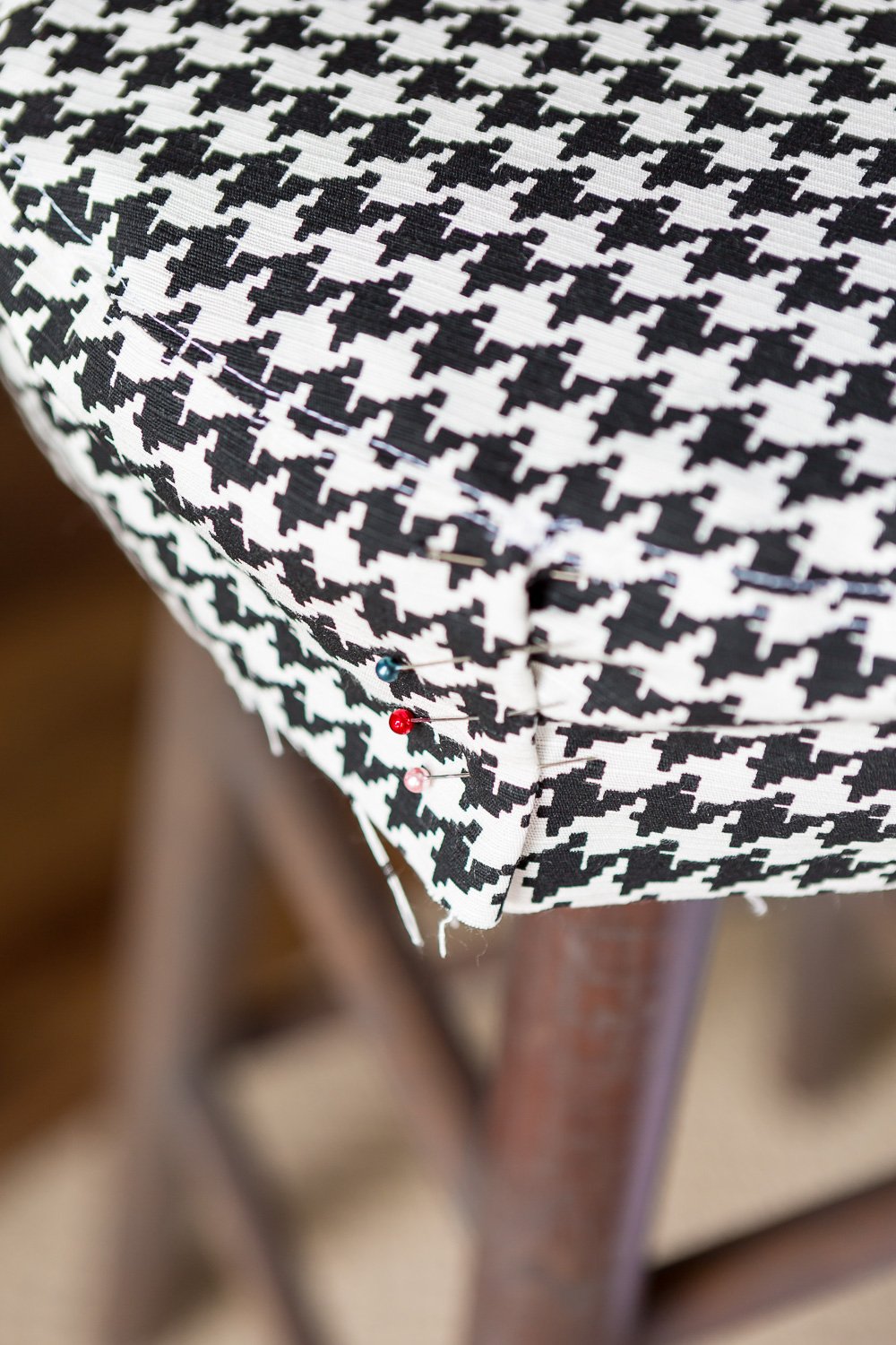 Black and white Herringbone fabric made into a round stool topper.