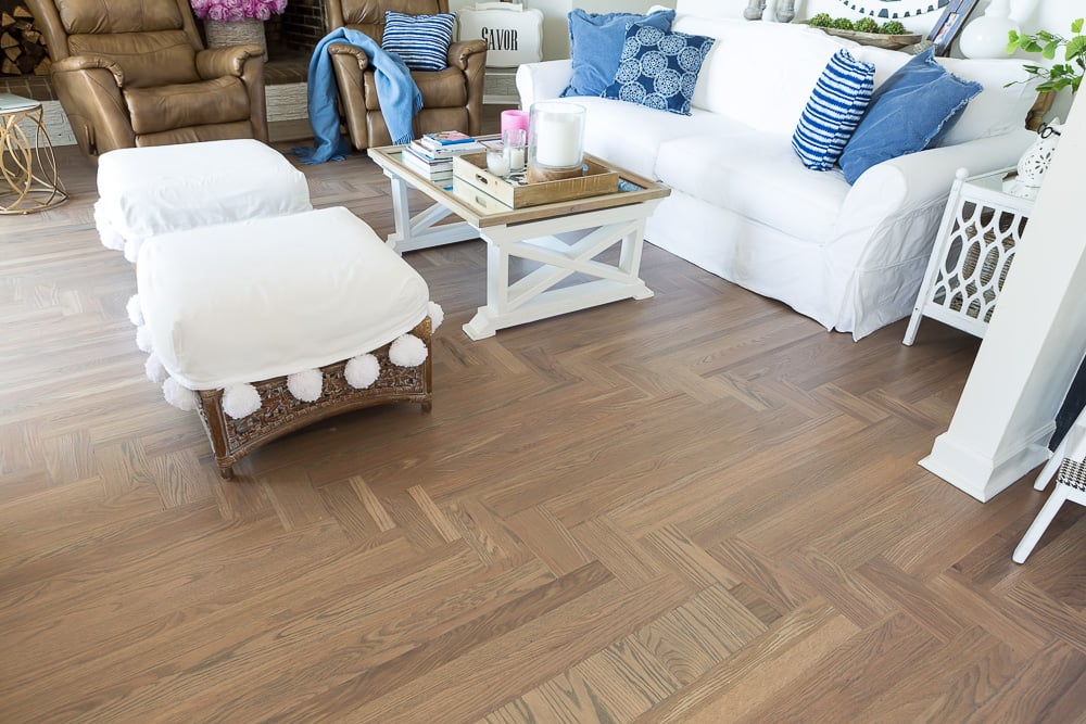 Up close look at color of newly refinished hardwood floor. The color is Bona Drifast stain in Grey.