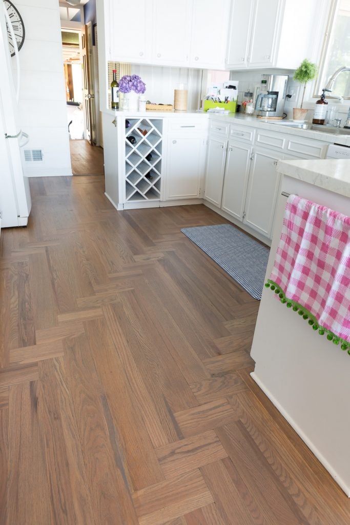 Summer decorating ideas for a kitchen. Kitchen showing newly refinished floor done by a Bona Certified Craftsman. The stain color is Grey.