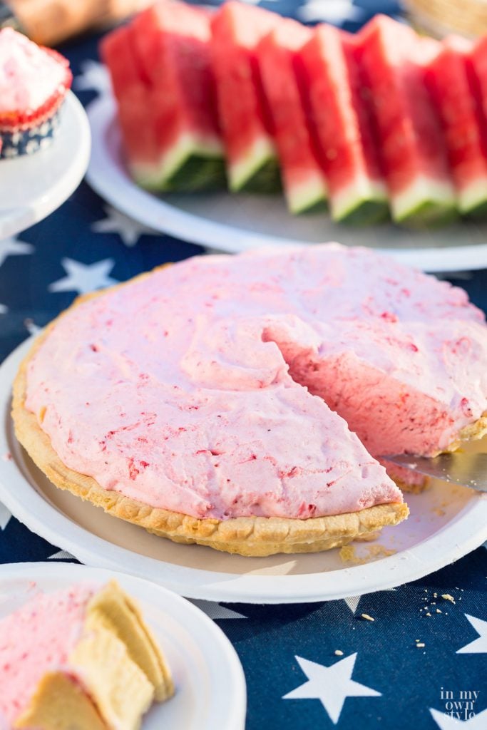 Frozen Pie and other desserts displayed on a picnic table.