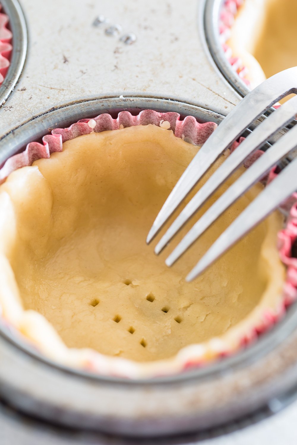 Poke pie shell with fork to prevent dough from bubbling up when baking.