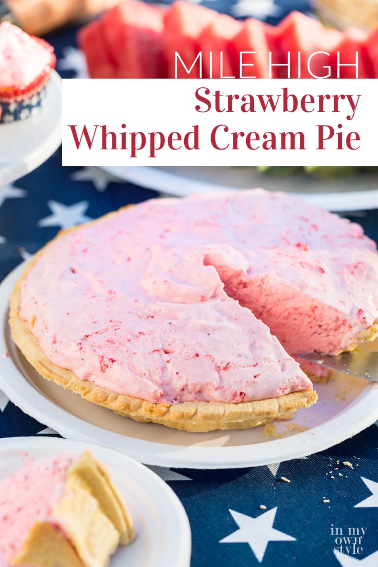 A Strawberry Whipped Cream pie with one slice cut out.