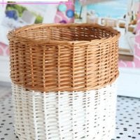 How to dip a thrift store wicker waste can in paint to give it a style update.