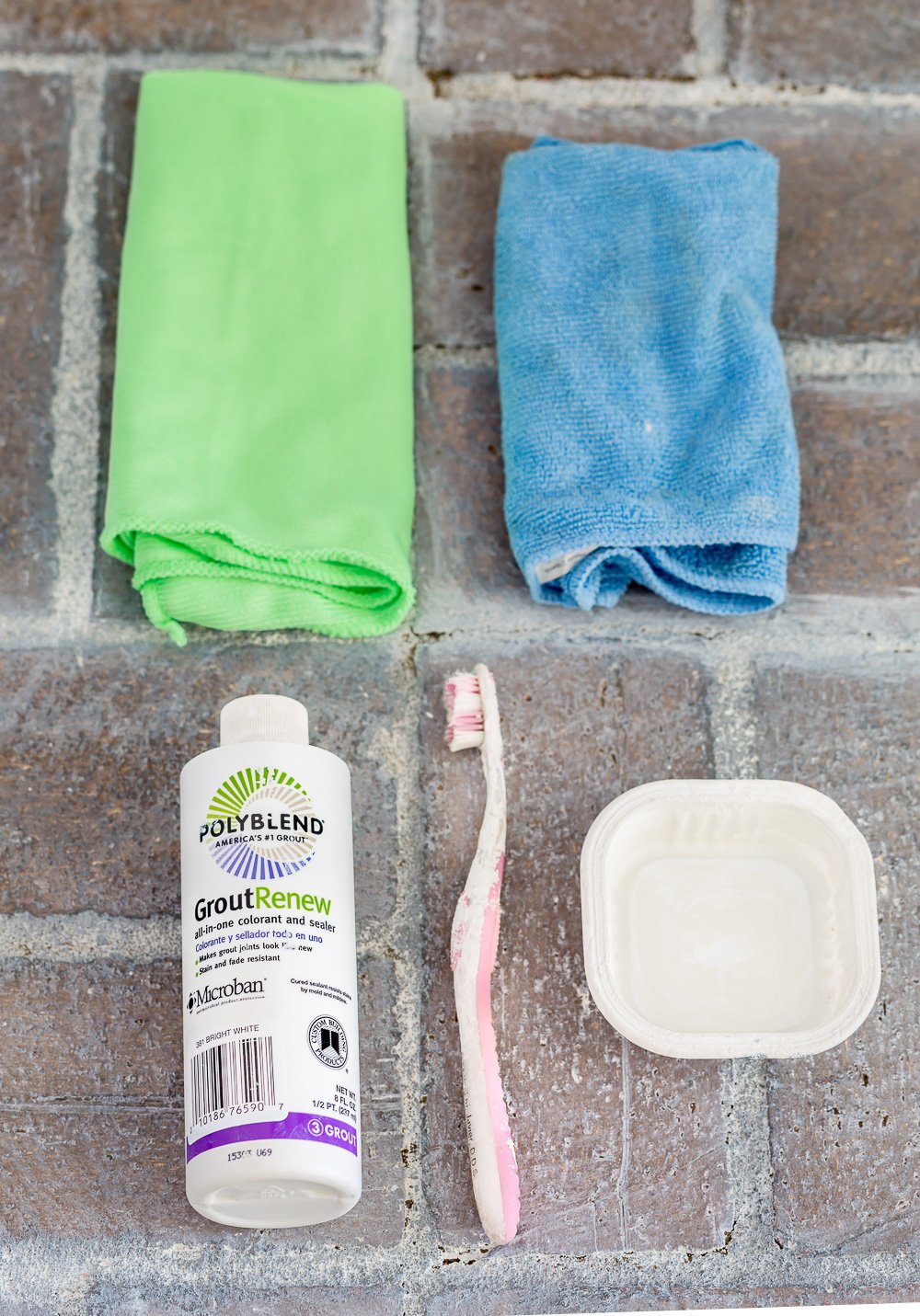supplies needed to whitewash bricks on a floor