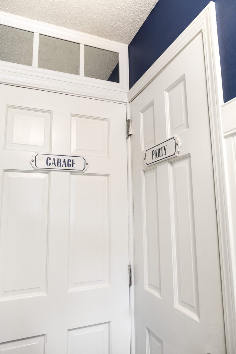 Hall closet that is used to hold entertaining items like paper plates, liquor and more.