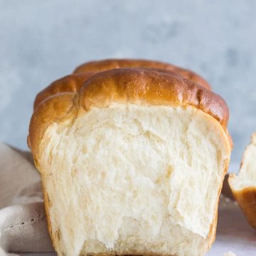 Loaf of vegan Hokkaido milk bread with the end torn off
