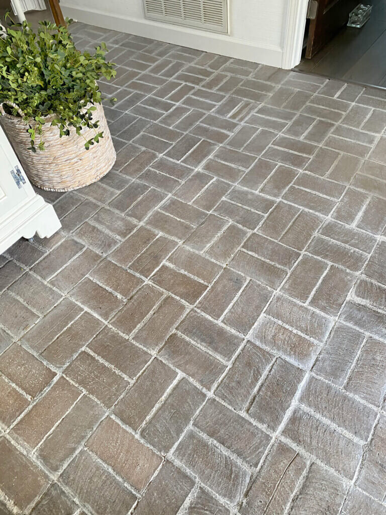 update on how DIY whitewashed brick floor has held up 