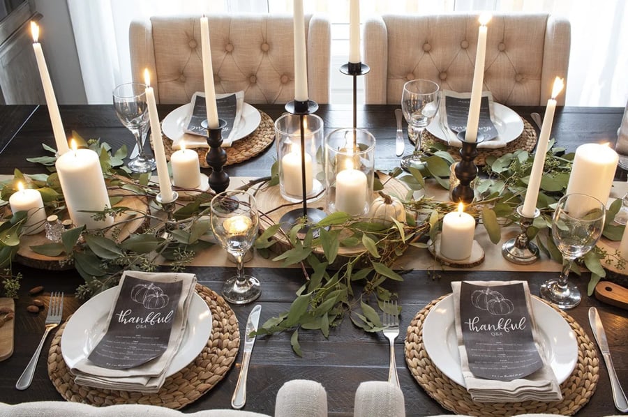 Rustic farmhouse dining table set on a dark wood table.