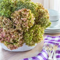 Fall decorating idea using a collapsible rattan basket.