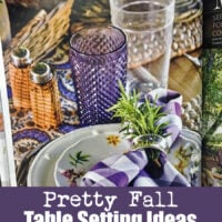 Pretty purple and white dining table decorated for fall.