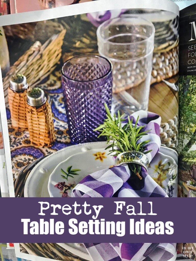 Pretty fall table setting using a purple and white color scheme.