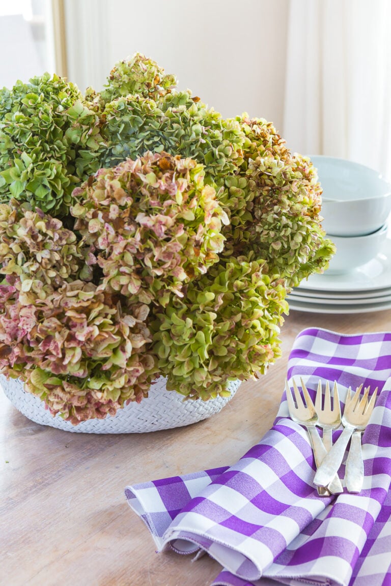 Easy and cheap diy fall decorating ideas using dried hydrangeas and a basket