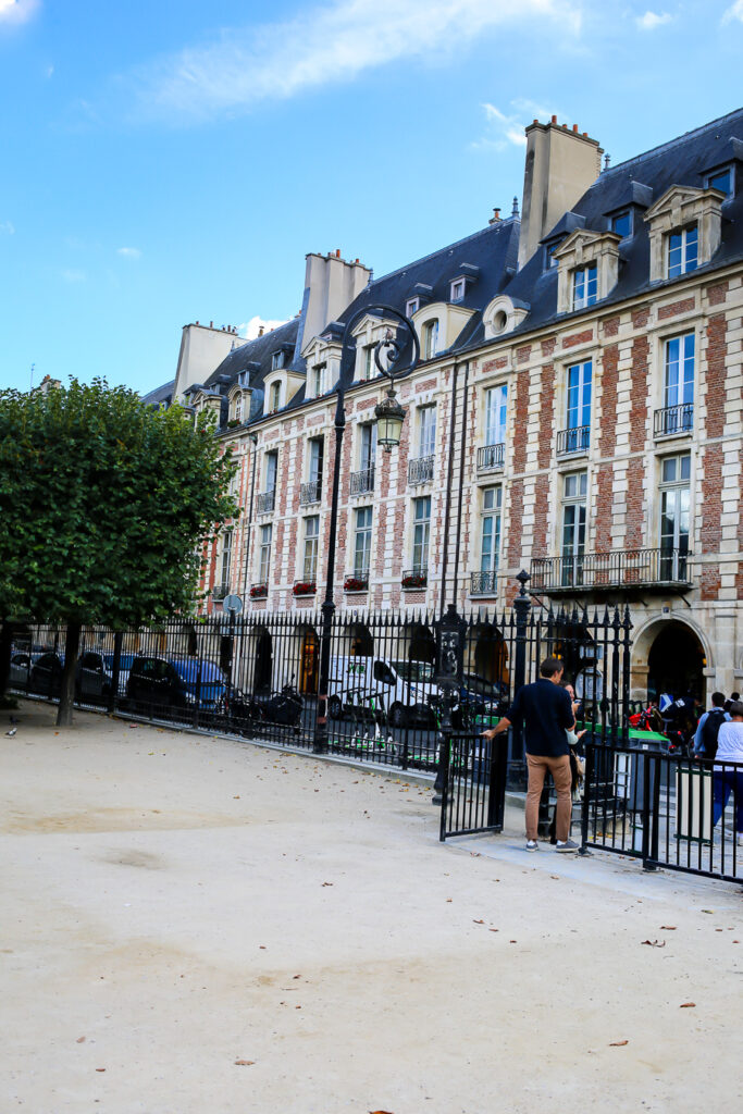 Things to see in Paris. Row of homes at the Place des Vosges in the Marais in Paris
