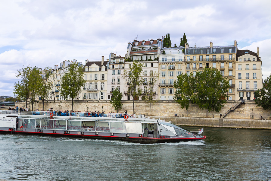 Tourist boat moving along the Seine in Paris
