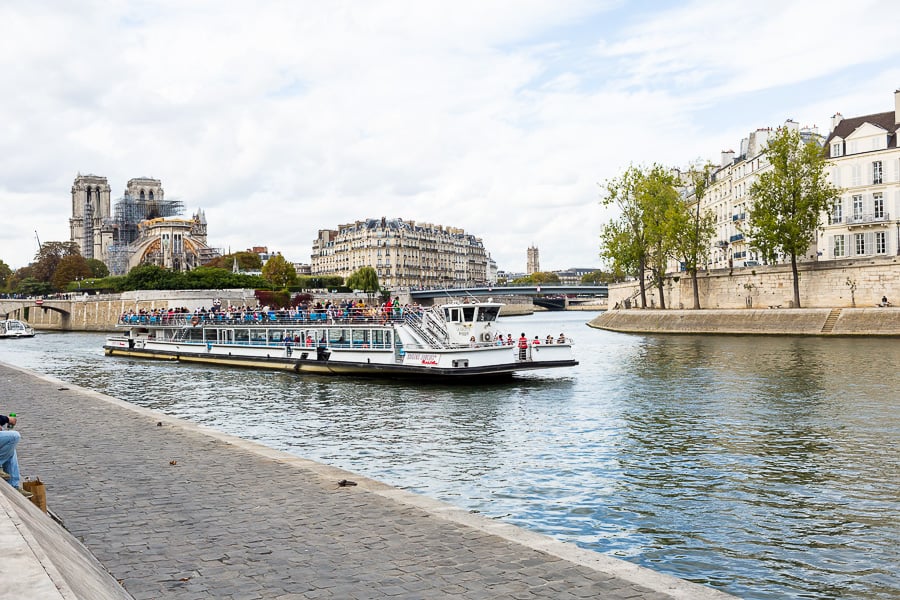 Tourist boat moving along the Seine in Paris